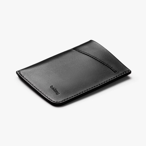 Black leather cardholder with 'bellroy' branding on a white background