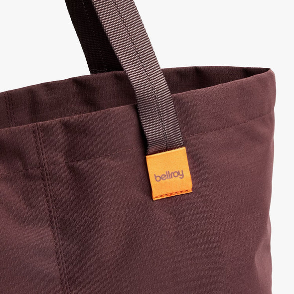 Bellroy City Tote Burgundy with a visible 'bellroy' brand tag on a white background