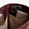 Phone and wallet in a pocket of a jacket