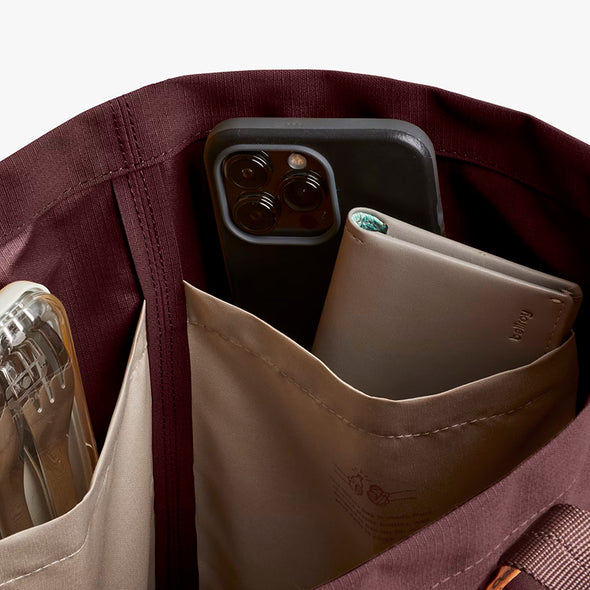 Phone and wallet in a pocket of a jacket