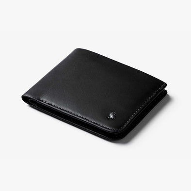 Black leather wallet on a light gray background