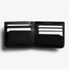 Black leather wallet with card slots on a white background