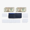 Black wallet with money and cards on a white background
