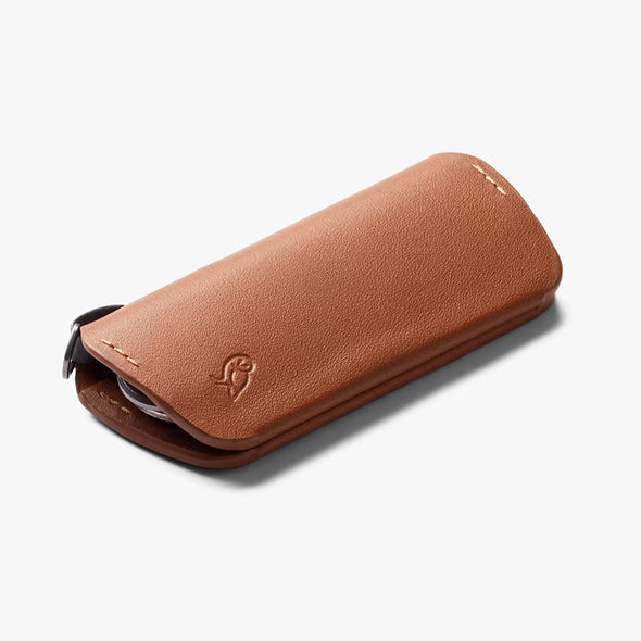 Brown leather case on a white background