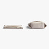 Beige fabric pouch and folded fabric on a white background