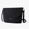Black messenger bag with 'bellroy' branding on a white background