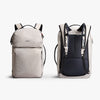 Two backpacks, one front view and one the back view showing shoulder straps, on a white background.