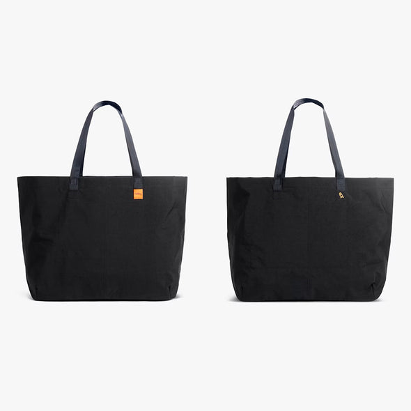 Two black tote bags on a white background