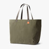Bellroy Market Tote Plus in willow green with a visible brand label on a white background