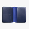 Blue leather wallet open on a white background