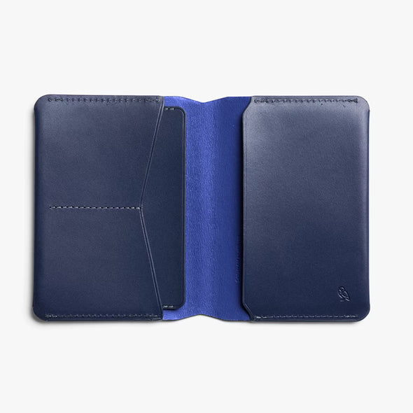 Blue leather wallet open on a white background