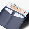Blue wallet with cards and documents on a white background