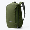 Green backpack on a white background