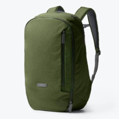 Green backpack on a white background