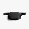 Black waist bag on a white background