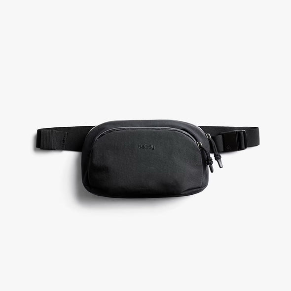 Black waist bag on a white background