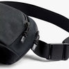 Black waist bag with a strap on a white background