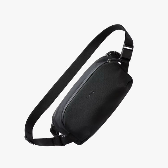 Black sling bag on a white background