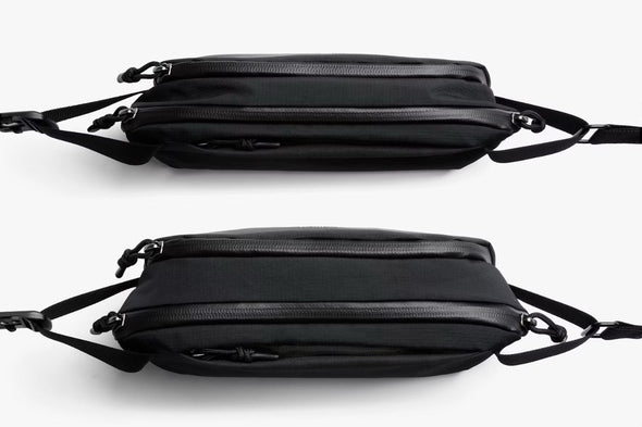 Two black crossbody bags on a white background