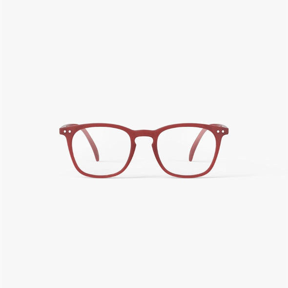 Red eyeglasses on a white background