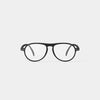 Black eyeglasses on a light gray background