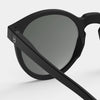 Black sunglasses with a gray lens on a white background