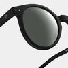 Black sunglasses with reflective lenses on a light gray background