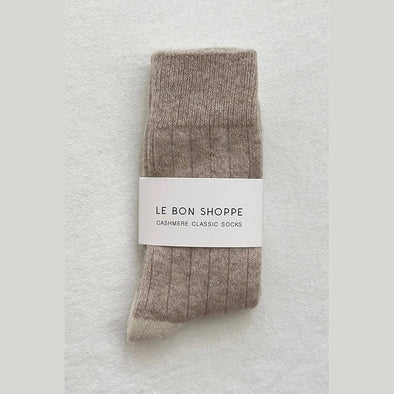 Fawn cashmere sock with 'Le Bon Shoppe' label on a light gray background