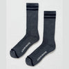 Pair of gray socks with black stripes and 'Le Bon Shoppe' branding on a light gray background