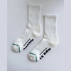White socks with text on a light gray background