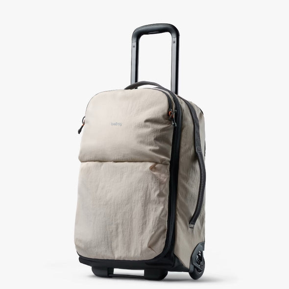 Lite Carry-On 38L by Bellroy Ash rolling suitcase on a white background