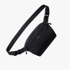 Black sling bag on a white background by Bellroy