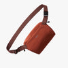 Clay Bellroy Lite Sling Mini 4L with a strap on a white background
