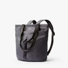 Gray tote bag with black straps on a white background