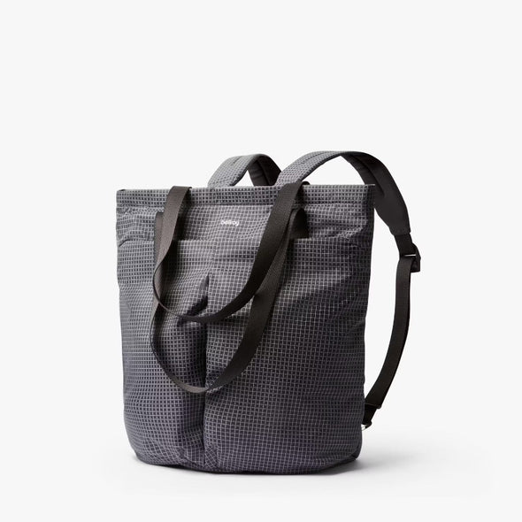 Gray tote bag with black straps on a white background