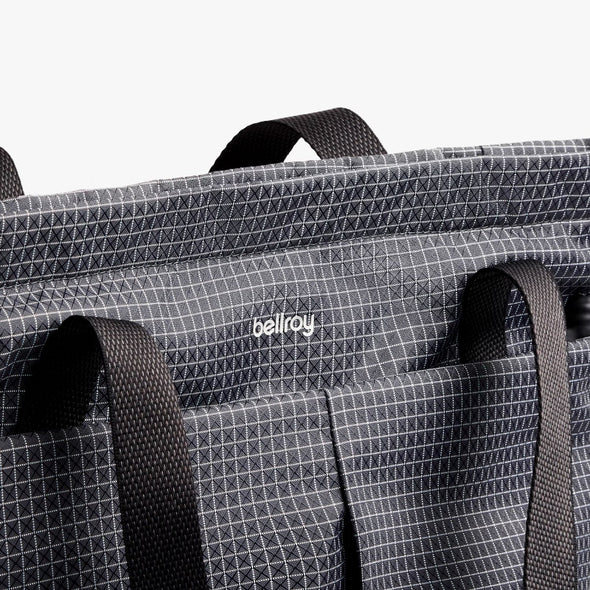 Gray bag with geometric pattern and 'bellroy' branding on a white background