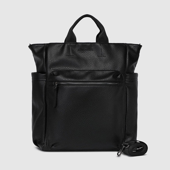 Black backpack with a strap on a light gray background