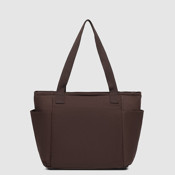 Brown tote bag on a light gray background