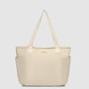 Beige tote bag with straps on a light gray background