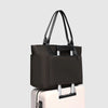 Black tote bag on a light gray background