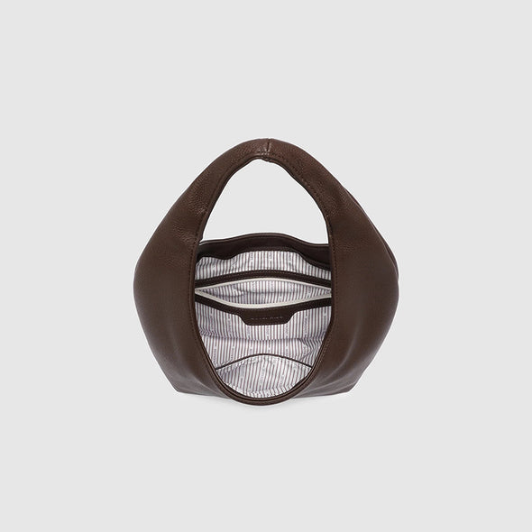 Brown leather product with mesh interior on a light gray background
