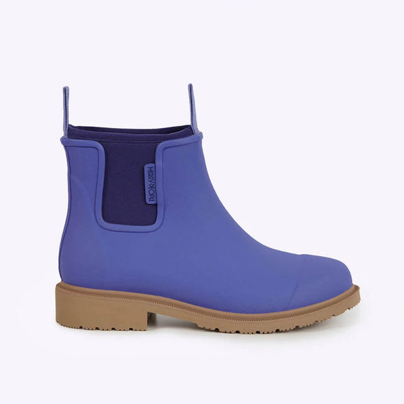 Blue rubber boot with brown sole on a white background