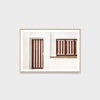 Framed artwork of a door with vertical slats on a white wall