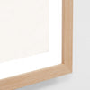 Close-up of a wooden frame corner on a white background
