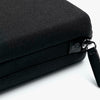 Black zippered pouch with a brand logo on a white background