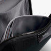 Gray bag with a visible 'bellroy' brand label on a white background