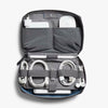 Tech Kit by Bellroy travel organizer with electronic accessories on a white background