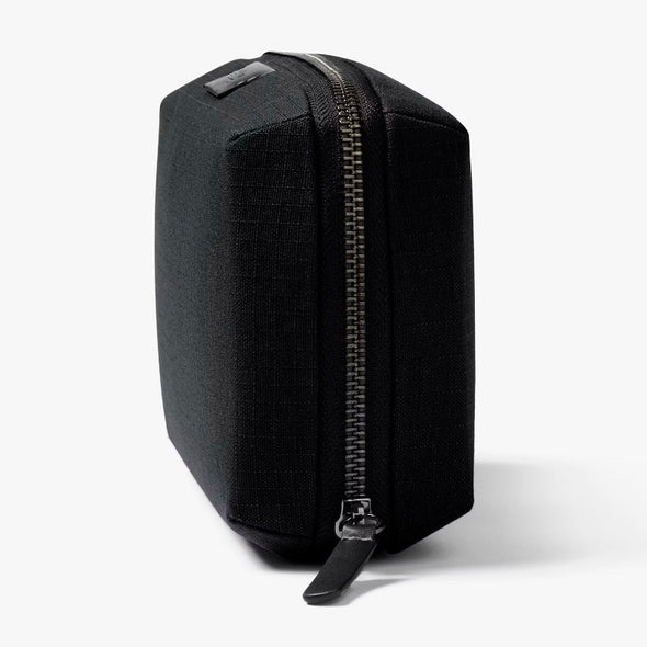 Tech Kit by Bellroy with a zipper on a white background