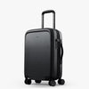 Black suitcase with wheels and handle on a white background