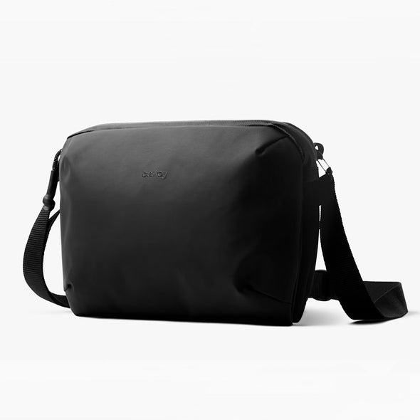 Black shoulder bag on a white background